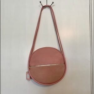 Pink leather oval purse